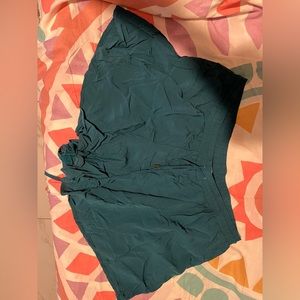 Dark green/blue shorts, if you don’t mind some chub run it’s very comfy.